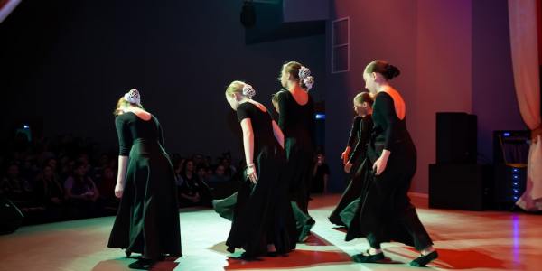 # The Glitter and Grit: Behind the Curtain of Dance Competitions